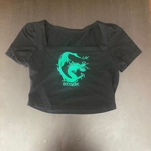 Black, cropped, and fitted dragon top in size small